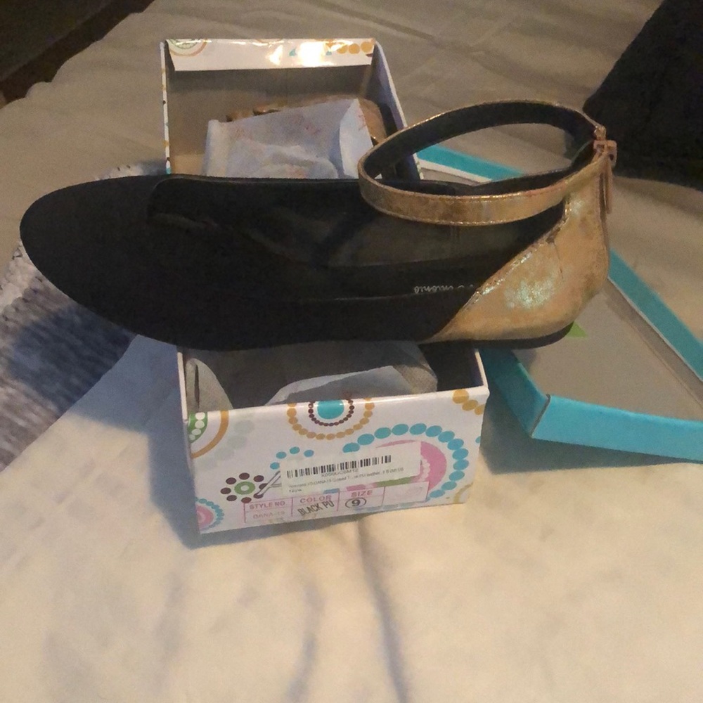 Black and gold flats